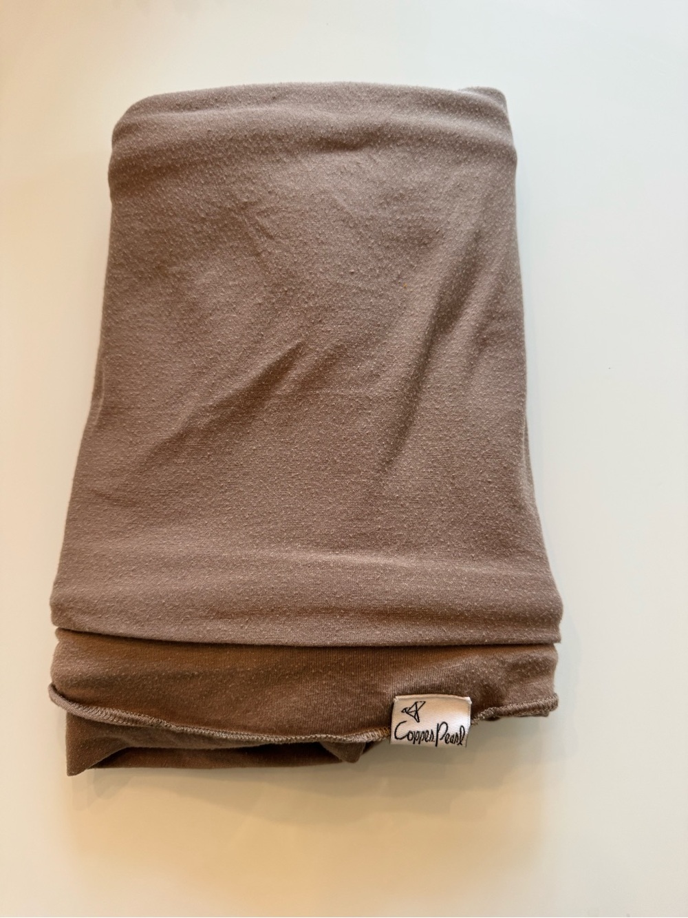 Copper pearl knit swaddle blanket
